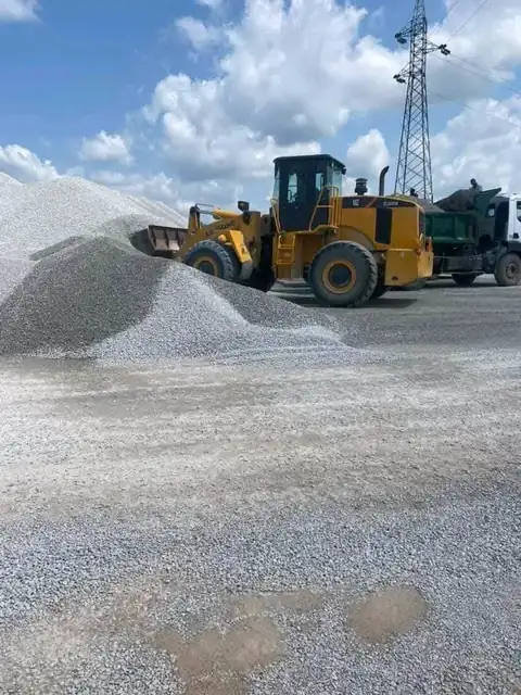 Wheel loader and tipper on the yard
